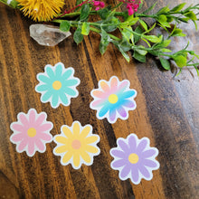 Load image into Gallery viewer, image of 5 mini muliti-colored daisy stickers on a wooden table
