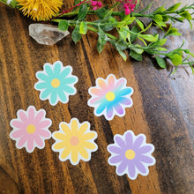 Load image into Gallery viewer, image of 5 mini muliti-colored daisy stickers on a wooden table